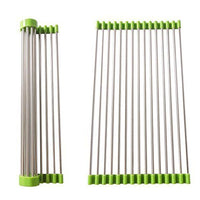 Stainless steel kitchen sink drain rack, extended over a sink for drying dishes.