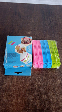 Plastic clips sealing different sized food bags with airtight hold