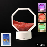 LED sand art lamp casting calming colored light creating a tranquil desktop ambiance
