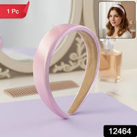 Elegant padded satin hairband displayed on a clean white background