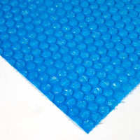 Blue air bubble packing roll, ideal for protecting fragile goods during transit or storage.