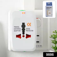 Universal travel adapter plugged into multiple devices for simultaneous charging