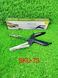 Versatile clever cutter in black, highlighting its food-grade stainless steel construction.