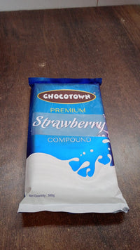 Ingredients list and nutritional information on the strawberry compound packaging.