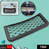 Velvet Wheels car storage mesh organizer installed in a car interior.