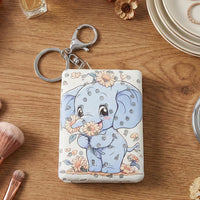 Foldable compact mirror keychain showing durable build and metal keyring