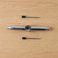 Compact multifunction spinner pen for stress relief and writing