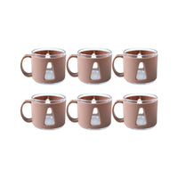 Tea cup set displayed on kitchen counter, ready for use