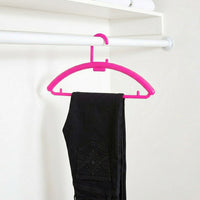 Plastic clothes hanger holder for wardrobe organization