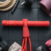 Outdoor use of pull rope resistance exerciser for dynamic workouts.