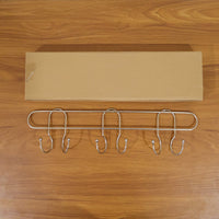 Compact wall mounted hook rack for small spaces